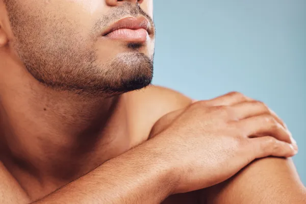 man-jaw-and-skincareing-and-beard